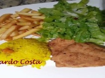 Fil de pescada branca com arroz de aafro.