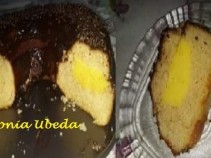 Bolo de laranja com recheio de creme de laranja e cobertura de ganache.
